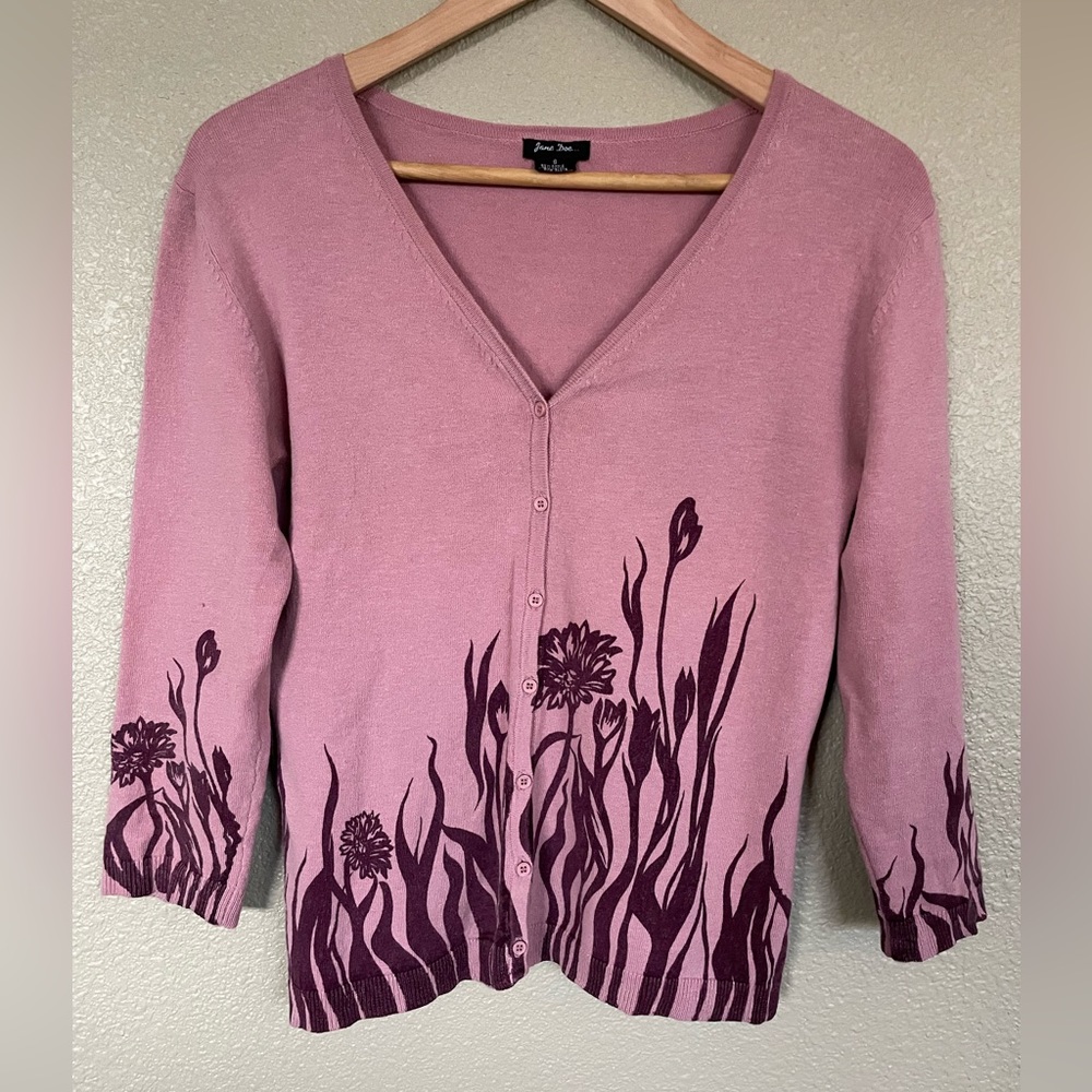 One of a kind pink cardigan with wine colored flowers growing from hem & cuffs.